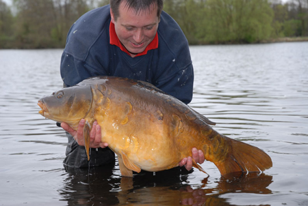 Terry Gibson with a hirty pound peach coloured-mirror